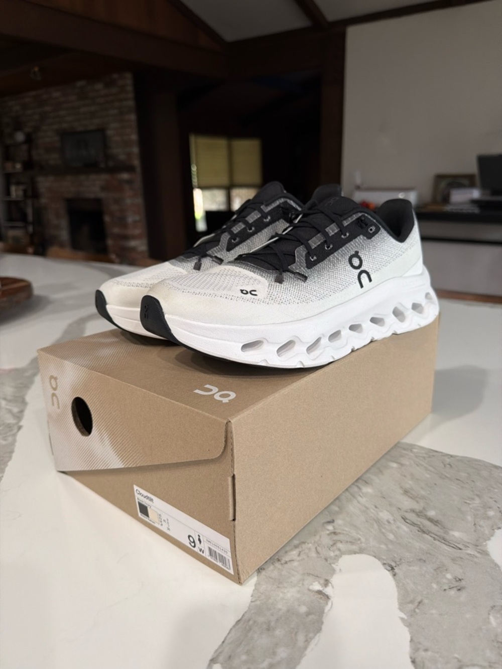 On Cloud White and Black Running Shoes